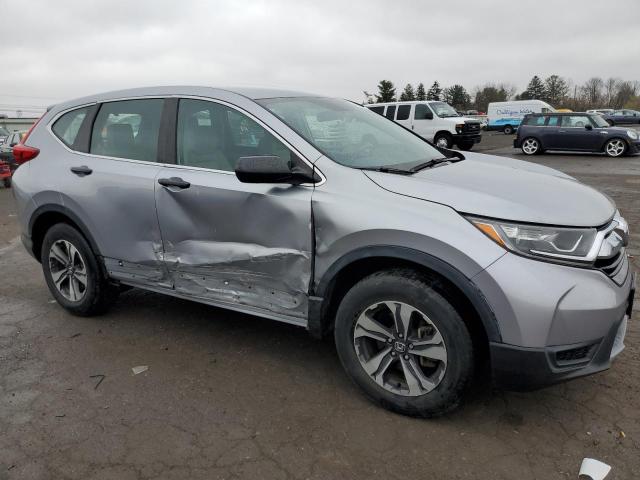 2HKRW6H35KH232879 - 2019 HONDA CR-V LX SILVER photo 4