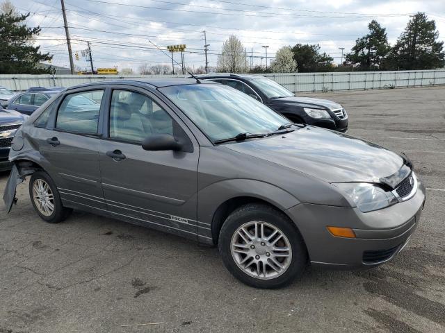 1FAFP34N27W311357 - 2007 FORD FOCUS ZX4 SILVER photo 4