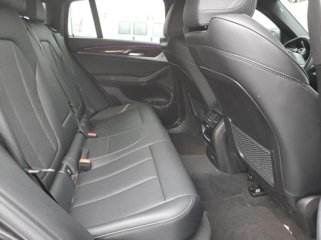 5UX33DT0XR9T92712 - 2024 BMW X4 XDRIVE30I შავი ფოტო 10