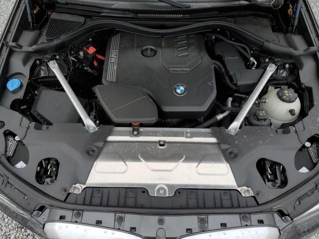 5UX33DT0XR9T92712 - 2024 BMW X4 XDRIVE30I შავი ფოტო 11