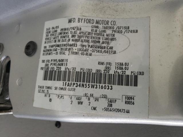 1FAFP34N55W316033 - 2005 FORD FOCUS ZX4 SILVER photo 12