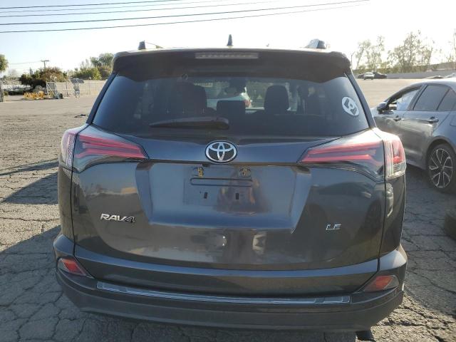 2T3ZFREV8HW378329 - 2017 TOYOTA RAV4 LE GRAY photo 6