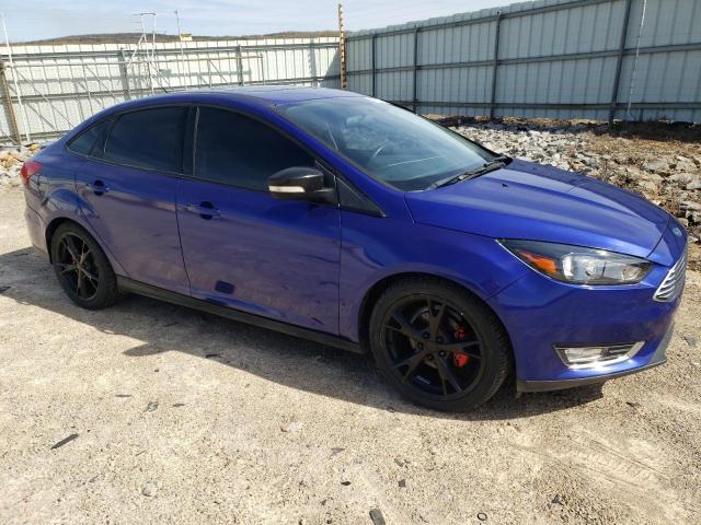 1FADP3J20FL259843 - 2015 FORD FOCUS TITANIUM BLUE photo 4