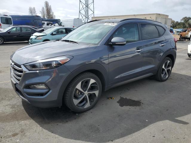 KM8J33A25GU070623 - 2016 HYUNDAI TUCSON LIMITED GRAY photo 1