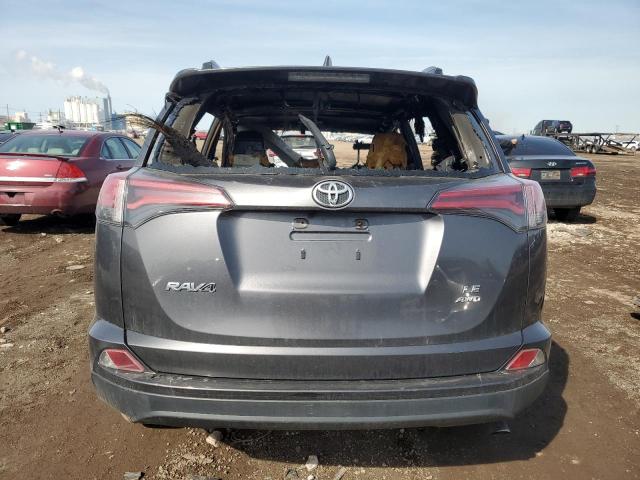 JTMBFREV3JJ725068 - 2018 TOYOTA RAV4 LE GRAY photo 6