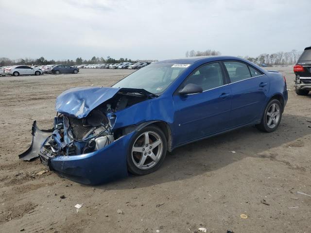 1G2ZG58N374216111 - 2007 PONTIAC G6 BASE BLUE photo 1