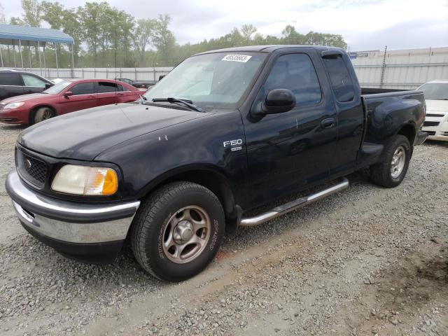 1FTZX0766WKA65638 - 1998 FORD F150 BLACK photo 1