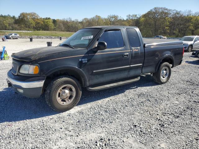 1FTRX18L6XNB76197 - 1999 FORD F150 BLACK photo 1