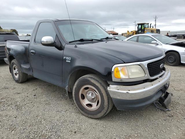 1FTRF07LXXKC15079 - 1999 FORD F150 BLACK photo 4