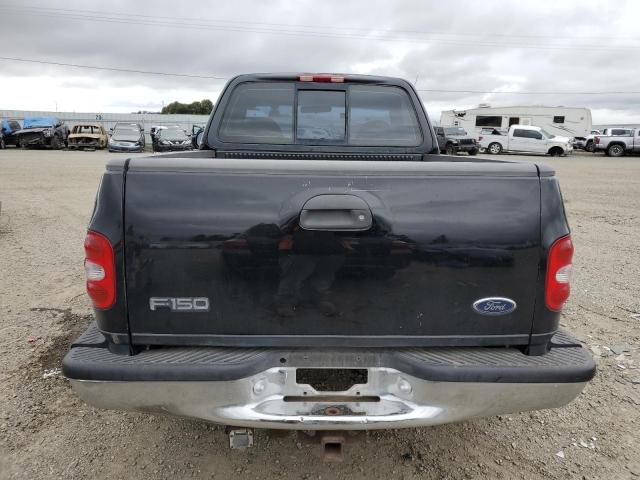 1FTRF07LXXKC15079 - 1999 FORD F150 BLACK photo 6