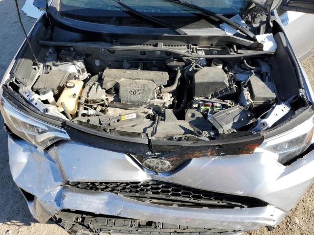 JTMNFREV5JD118035 - 2018 TOYOTA RAV4 SE SILVER photo 11