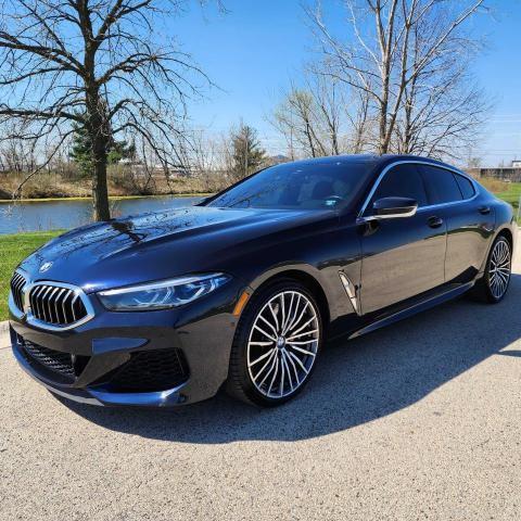 WBAGV8C09LCE21681 - 2020 BMW M850XI BLUE photo 1