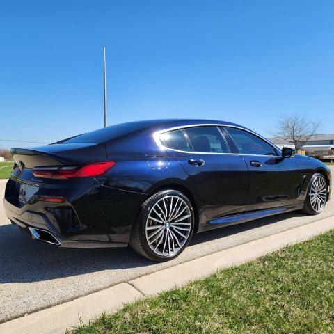 WBAGV8C09LCE21681 - 2020 BMW M850XI BLUE photo 4