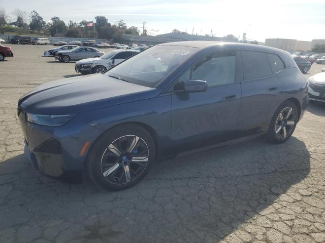 WB523CF03PCM86512 - 2023 BMW IX XDRIVE50 BLUE photo 1