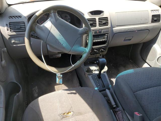 KNADC125746319905 - 2004 KIA RIO SILVER photo 8