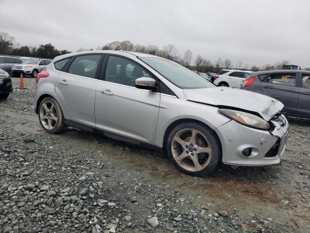 1FAHP3N21CL353219 - 2012 FORD FOCUS TITANIUM SILVER photo 4