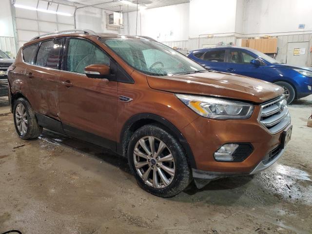 1FMCU9J99HUC82397 - 2017 FORD ESCAPE TITANIUM GOLD photo 4