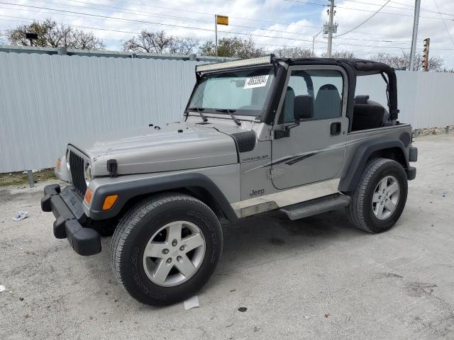 1J4FA29P7YP787092 - 2000 JEEP WRANGLER / SE GRAY photo 1