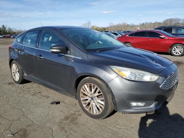 1FADP3N25HL287280 - 2017 FORD FOCUS TITANIUM GRAY photo 4