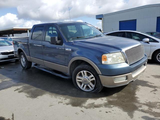 1FTPW12545KC18353 - 2005 FORD F150 SUPERCREW BLUE photo 4