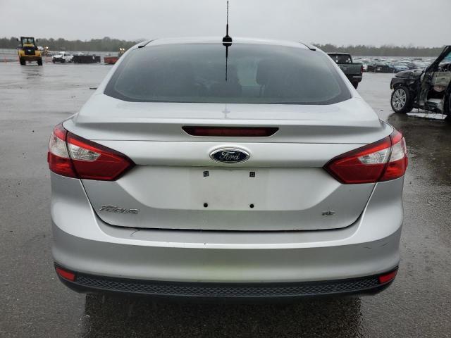 1FAHP3F26CL246696 - 2012 FORD FOCUS SE SILVER photo 6