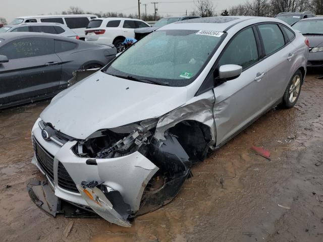 1FAHP3F2XCL471977 - 2012 FORD FOCUS SE SILVER photo 1