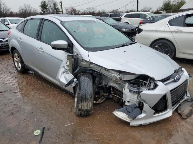 1FAHP3F2XCL471977 - 2012 FORD FOCUS SE SILVER photo 4