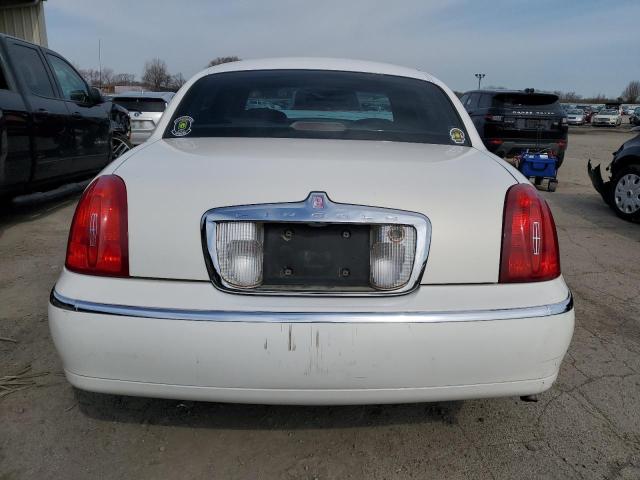 1LNHM82W7XY668893 - 1999 LINCOLN TOWN CAR SIGNATURE WHITE photo 6