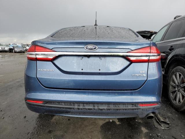 3FA6P0LUXJR257386 - 2018 FORD FUSION SE HYBRID BLUE photo 6