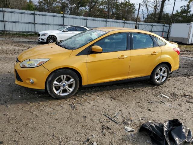1FAHP3F27CL182829 - 2012 FORD FOCUS SE YELLOW photo 1