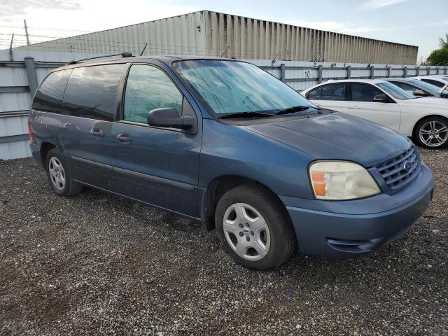 2FMZA51676BA01539 - 2006 FORD FREESTAR SE BLUE photo 4