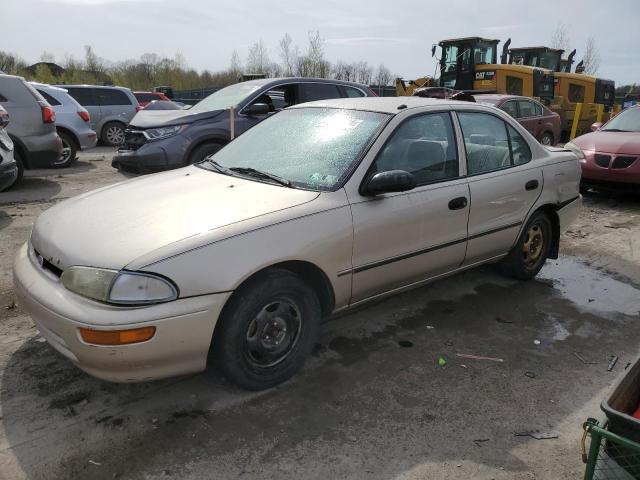 1Y1SK5260SZ097826 - 1995 CHEVROLET GEO PRIZM BASE GOLD photo 1