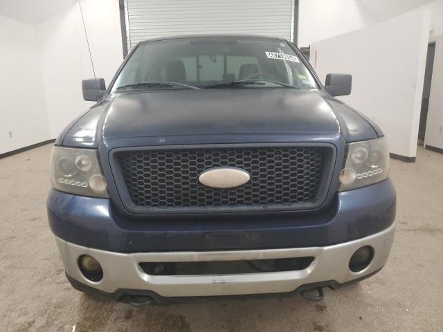 1FTPX14506FB13023 - 2006 FORD F150 BLUE photo 5