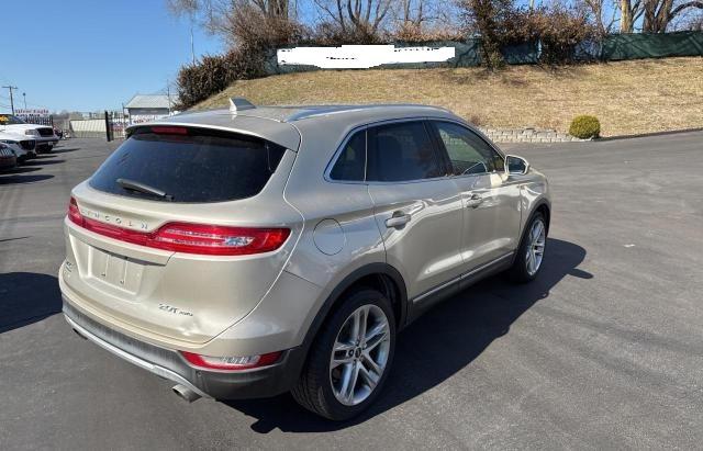 5LMCJ3D91HUL27895 - 2017 LINCOLN MKC RESERVE ოქროსფერი ფოტო 4