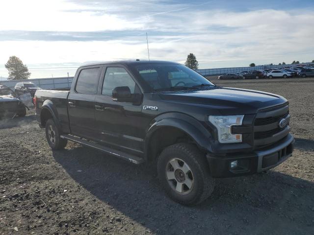 1FTFW1EF9FFA31569 - 2015 FORD F150 SUPERCREW BLACK photo 4