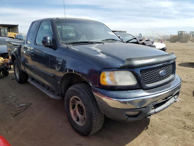 1FTRX18L6YKA06568 - 2000 FORD F150 BLACK photo 4