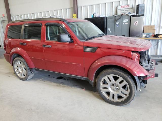 1D4PU5GX9AW112624 - 2010 DODGE NITRO SXT RED photo 4