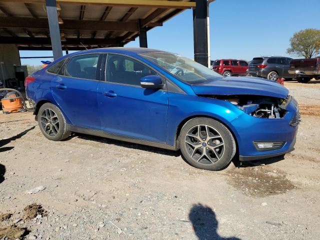 1FADP3F21JL211057 - 2018 FORD FOCUS SE BLUE photo 4