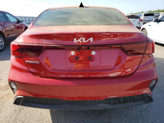 3KPF24AD7PE554084 - 2023 KIA FORTE LX RED photo 6