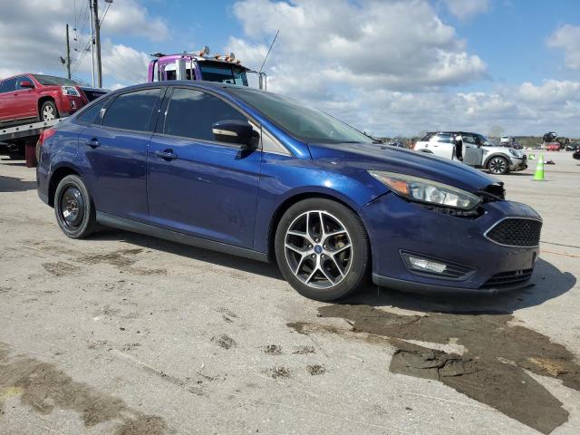 1FADP3H20HL305390 - 2017 FORD FOCUS SEL BLUE photo 4