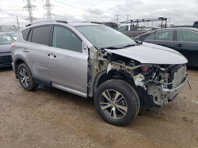 2T3RFREV7HW558806 - 2017 TOYOTA RAV4 XLE SILVER photo 4