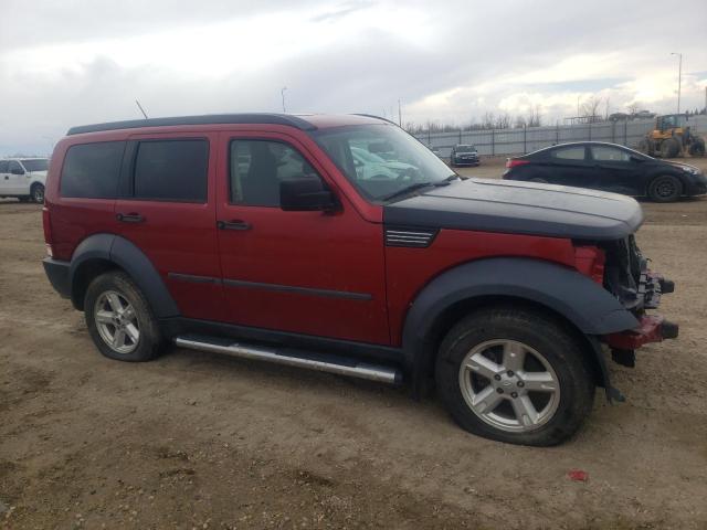 1D8GU28K87W634900 - 2007 DODGE NITRO SXT RED photo 4