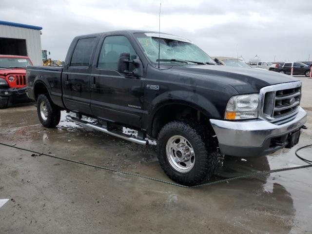 1FTNW21F31EA22680 - 2001 FORD F250 SUPER DUTY BLACK photo 4