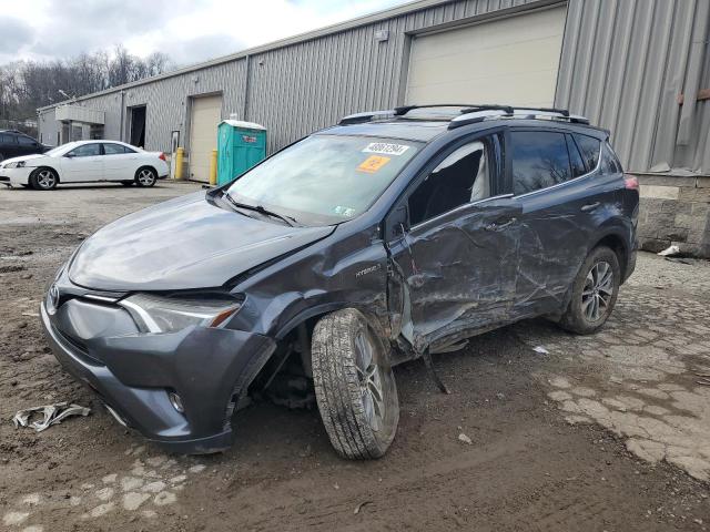 JTMRJREV6GD054077 - 2016 TOYOTA RAV4 HV XLE GRAY photo 1