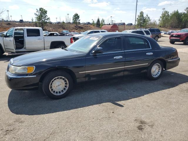 1LNFM81W1WY615808 - 1998 LINCOLN TOWN CAR EXECUTIVE Schwarz Foto 1