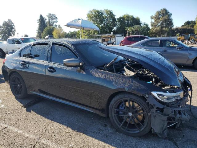 3MW5U7J02M8B91706 - 2021 BMW M340I BLACK photo 4