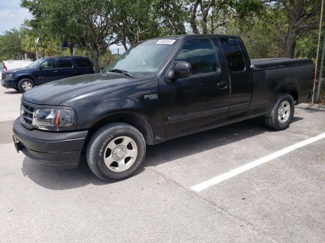 2FTZX1726YCA60255 - 2000 FORD F150 BLACK photo 1