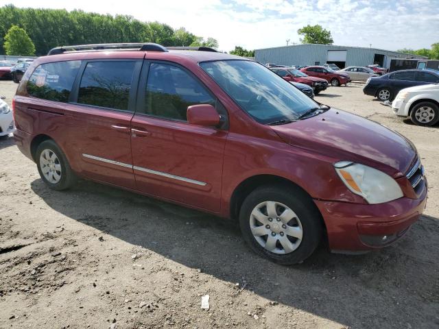 KNDMC233376025718 - 2007 HYUNDAI ENTOURAGE GLS RED photo 4