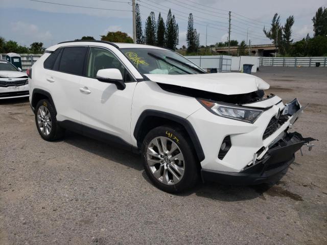 JTMC1RFV3KD029425 - 2019 TOYOTA RAV4 XLE PREMIUM WHITE photo 4