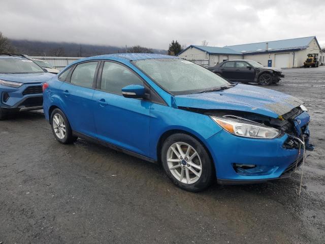 1FADP3F21FL365307 - 2015 FORD FOCUS SE BLUE photo 4